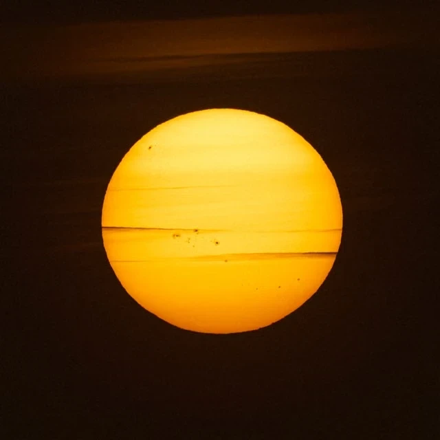 Astrophysical Analysis of the Youngest Confirmed Exoplanet Discovered to Date